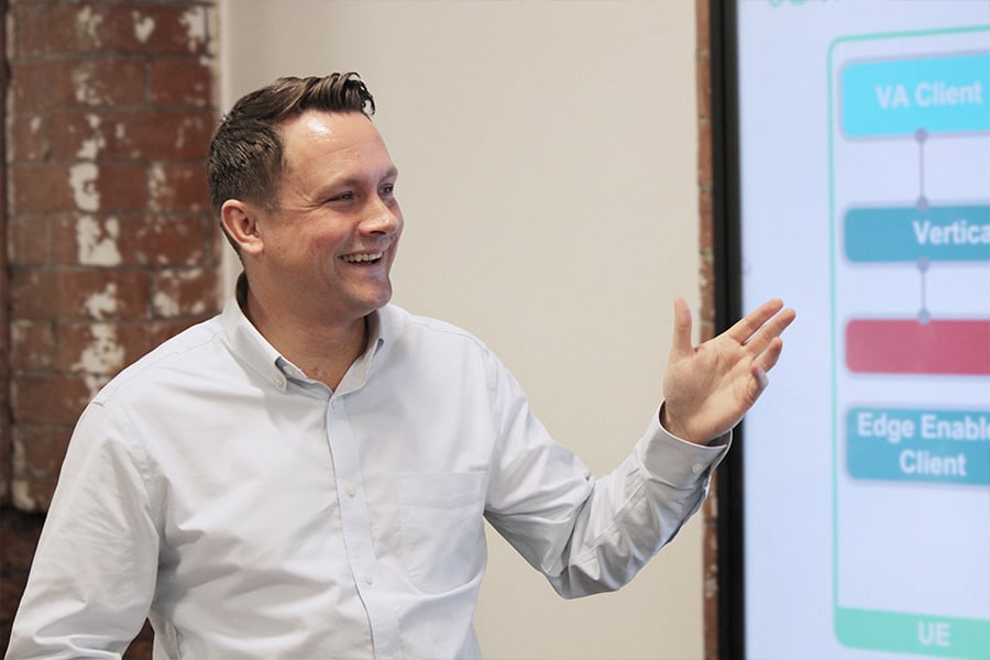 Mpirical trainier delivering telecoms training during a live session