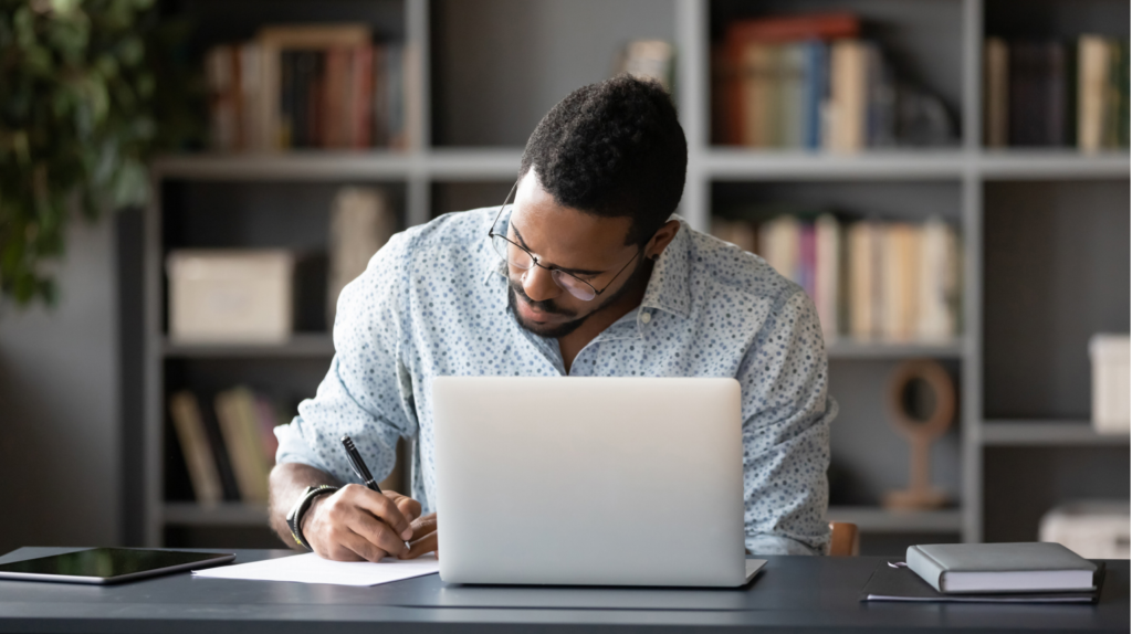 Man studying with laptop