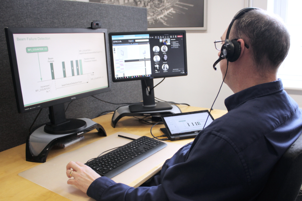 Instructor delivering training to students online with webcam