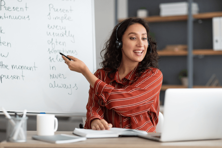 woman teaching classroom online