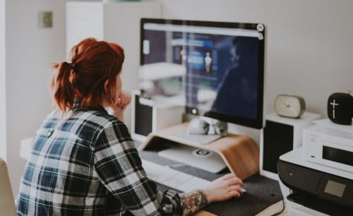 Woman on computer e-learning