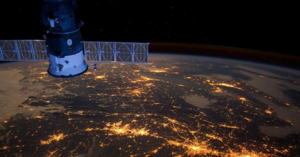 A satellite in space, orbiting above the Earth's surface.