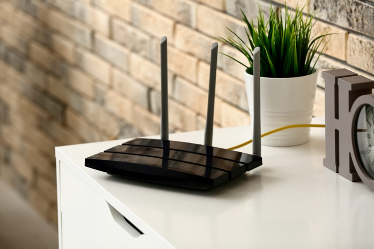 Wi fi router sitting on a white unit