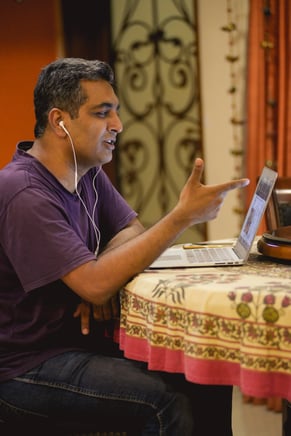 Man engaging with other online learners