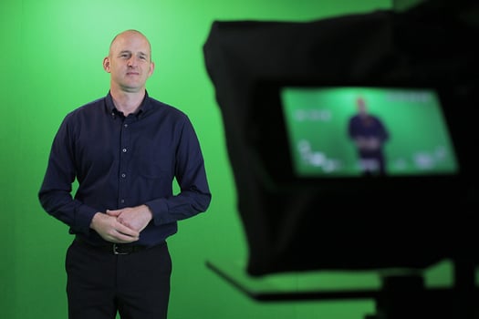 Mpirical trainer Gavin presenting in the green screen studio for on-demand video training
