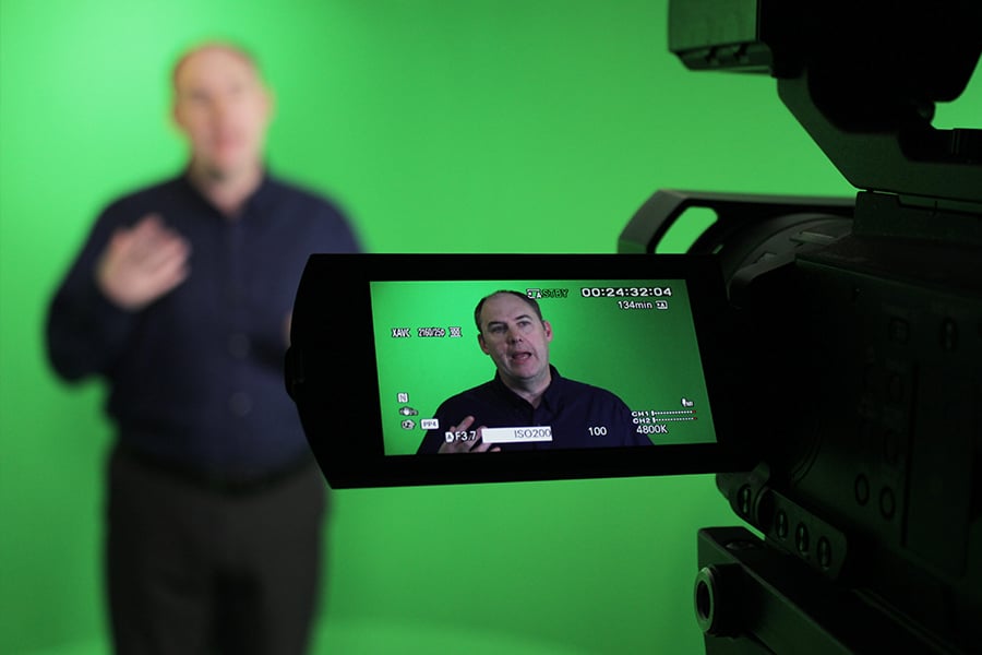 Mpirical trainer Philip presenting in the green screen studio for on-demand video training