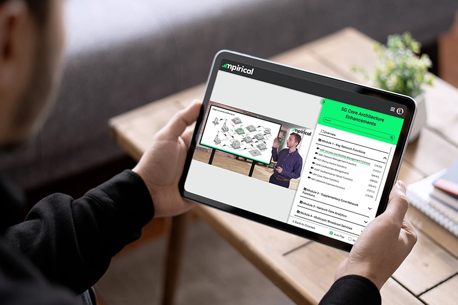 Man watching 5G training on tablet device