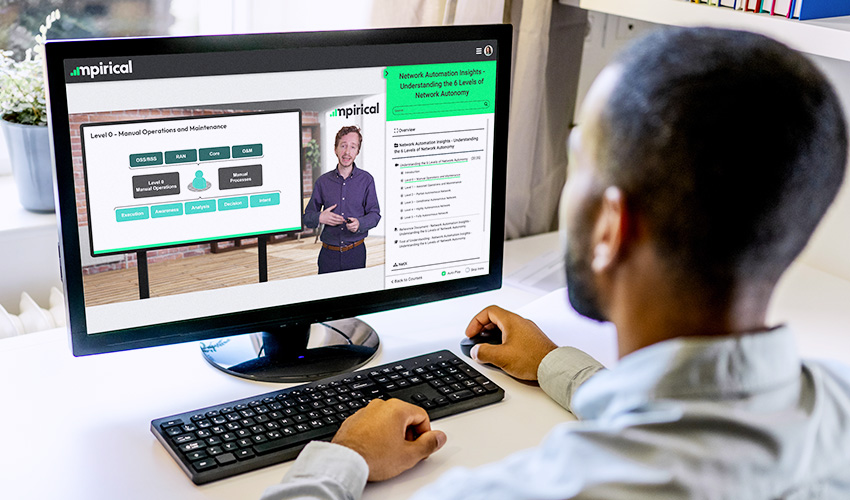 User watching Network Automation Insights video on computer