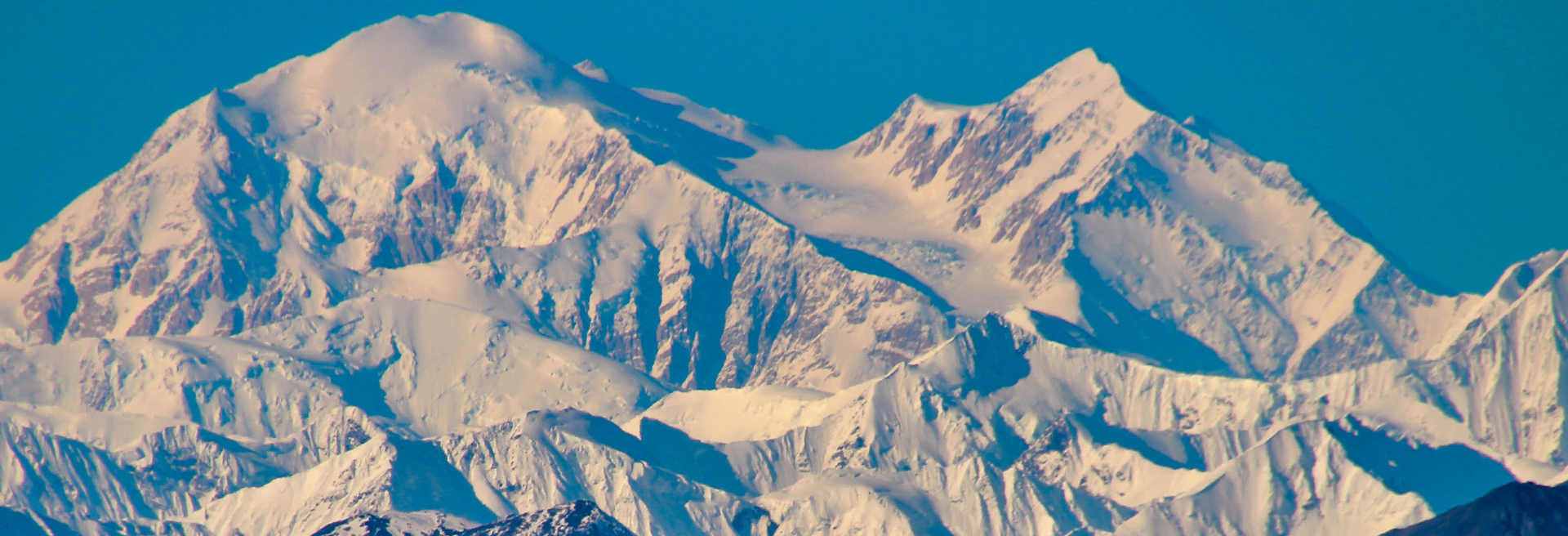 GCI case study header image - Alaskan mountains