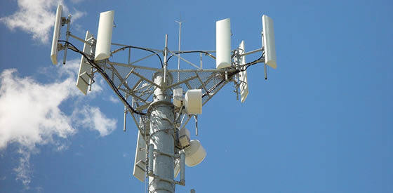 cell tower on blue sky background