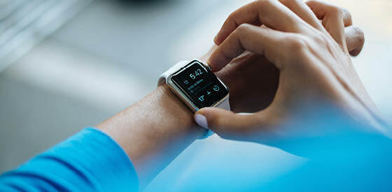 person setting their smart watch